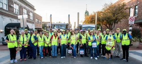 Peterbilt employees at the Pride & Class Parade gathering donations for the United Way