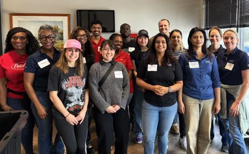 Peterbilt employees gathered together at Our Daily Bread homeless shelter in Denton, Texas